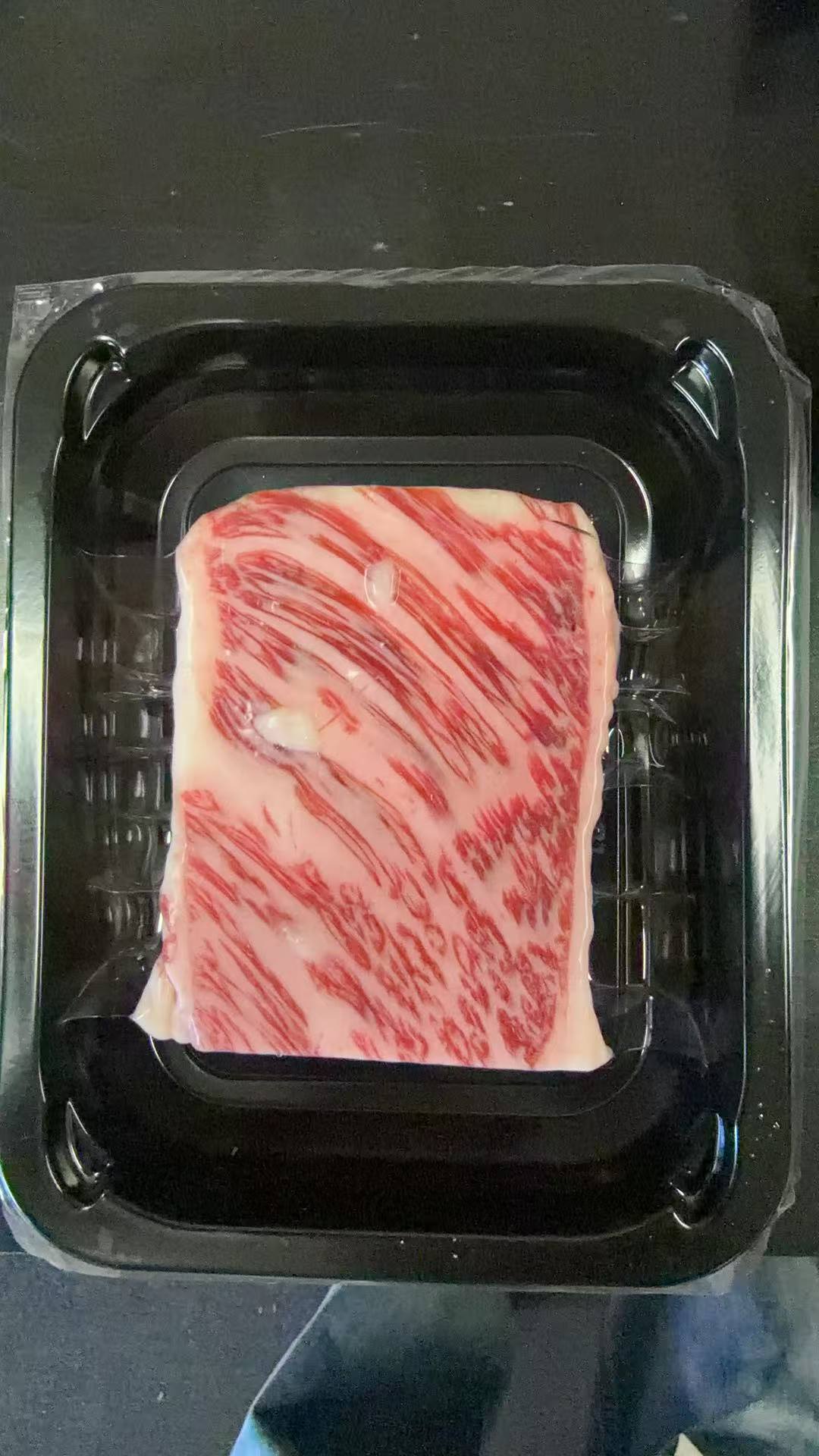 Premium sliced beef in retail packaging